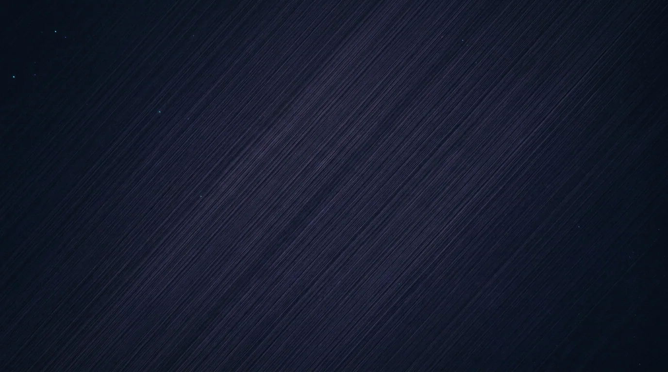 A cold dark expanse of deep space filled edge to edge with an extremely fine violet grain, every filament running in the same direction, so the darkness reads as a substance with a preferred direction rather than as emptiness.